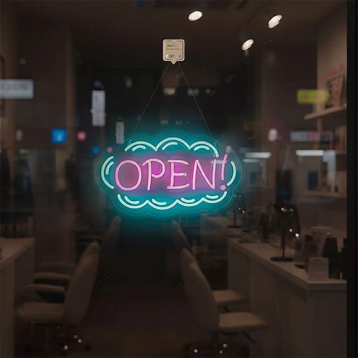 Neon 'OPEN!' sign in a nail salon setting